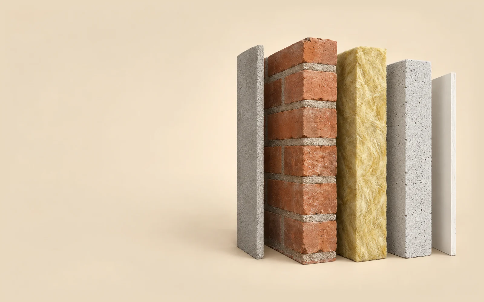 A wall opened layer by layer: render, 115 mm brick, 100 mm mineral wool, 100 mm aerated block and plasterboard.